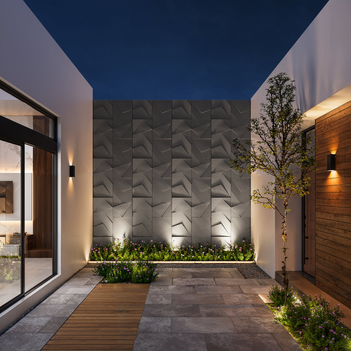 ANDROMEDA 3D concrete wall tile by ModaConcrete — geometric feature wall on a modern outdoor patio at night