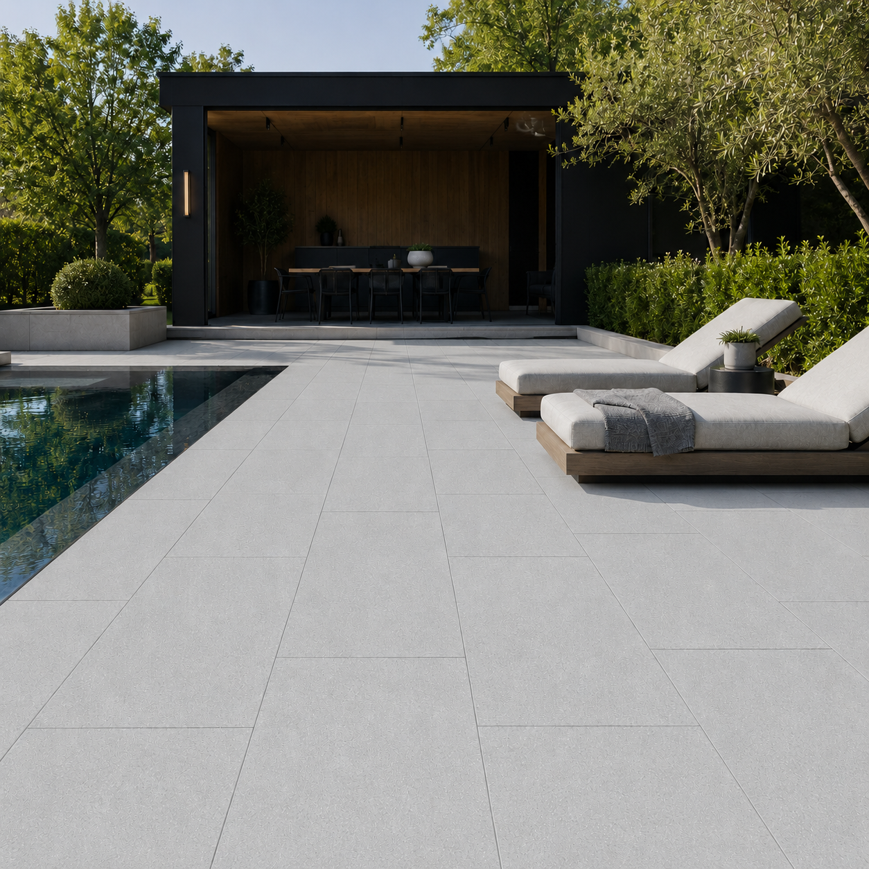 ModaPAVE 32x16 grade-set wet-cast concrete pavers in Gray installed in a modern outdoor lifestyle setting — ModaConcrete