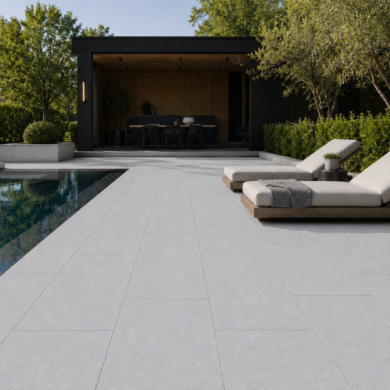 ModaPAVE 32x16 grade-set wet-cast concrete pavers in Platinum installed in a modern outdoor lifestyle setting — ModaConcrete