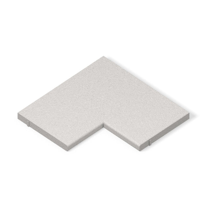 ModaPAVE inside corner concrete pool coping in White, one-piece L corner with bullnose water edges, three-quarter view