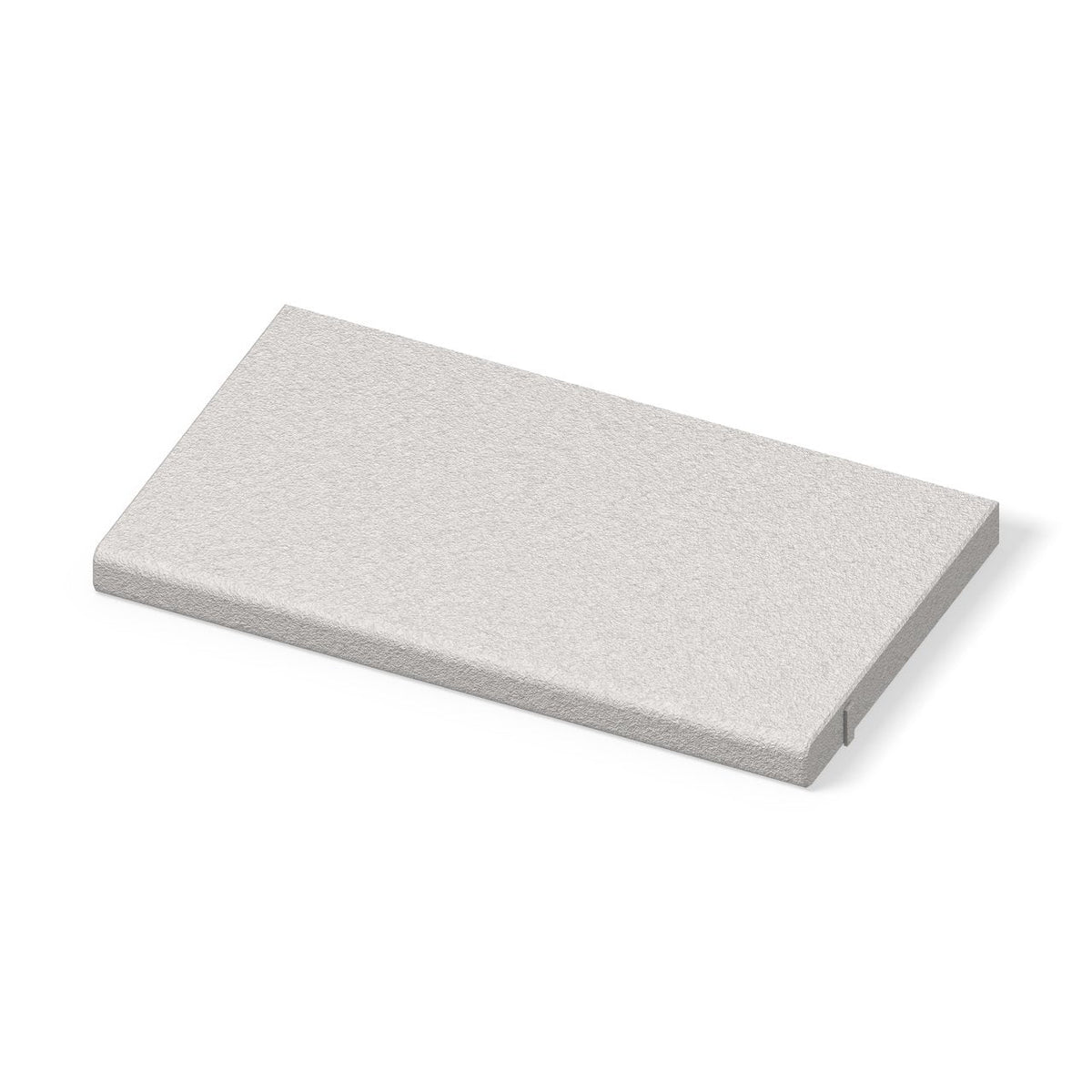 ModaPAVE straight concrete pool coping in White, bullnose water edge and bush-hammered top, three-quarter view