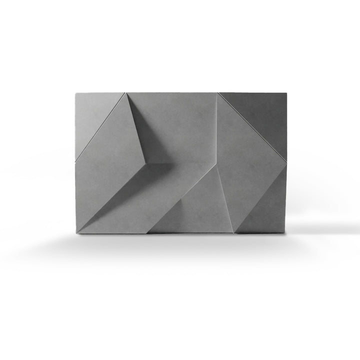 ModaWALL ANDROMEDA 3D concrete wall tile in Gray, studio render of the angular facets