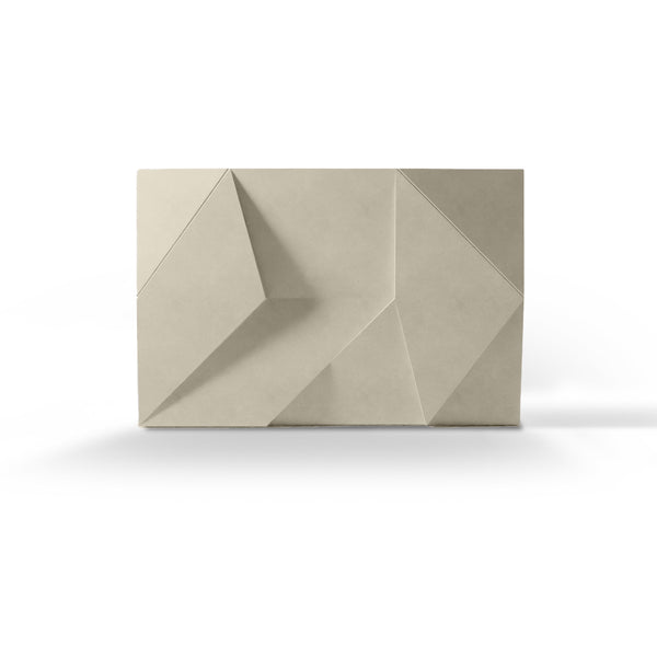 ModaWALL ANDROMEDA 3D concrete wall tile in Sand, studio render of the angular facets