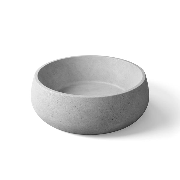 Pebble ModaCAST GFRC concrete vessel sink in Gray, angled studio render of the rounded bowl