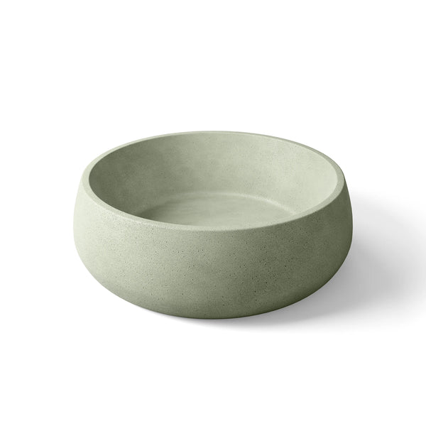 Pebble ModaCAST GFRC concrete vessel sink in Sage, angled studio render of the rounded bowl