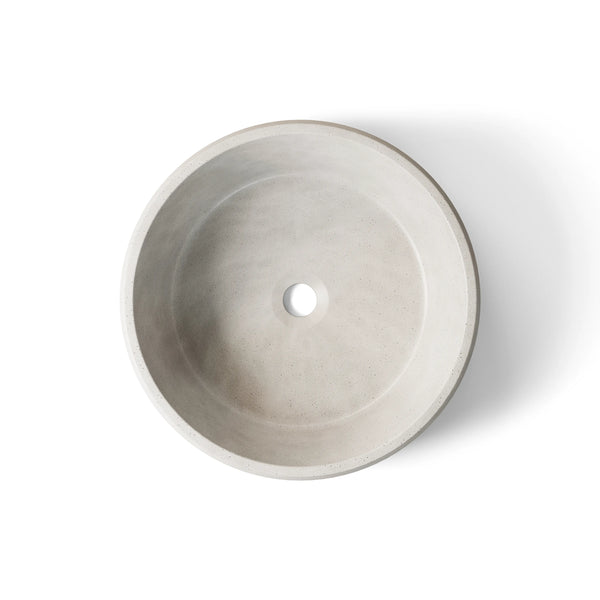 Pebble ModaCAST GFRC concrete vessel sink in White, top-down view of the bowl and drain