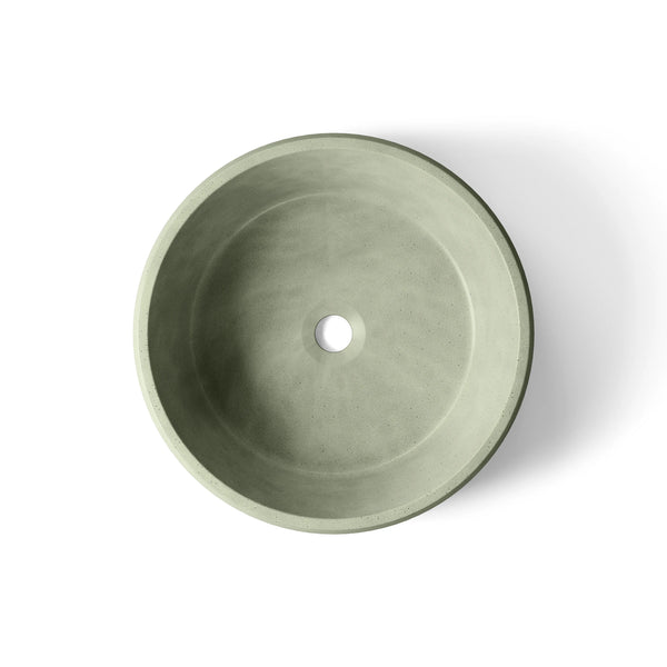 Pebble ModaCAST GFRC concrete vessel sink in Sage, top-down view of the bowl and drain